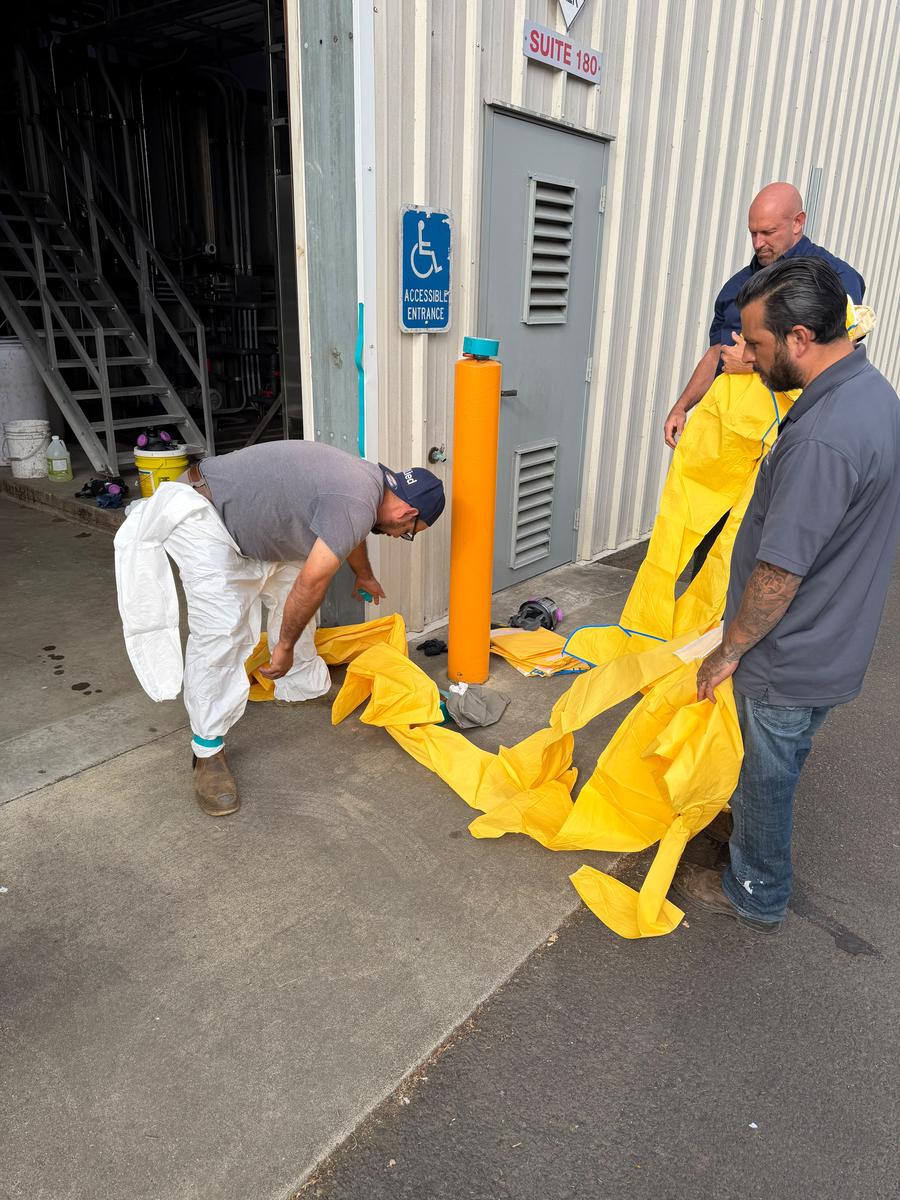 Allied biohazard response team preparing for decontamination