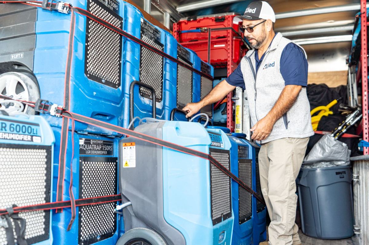 Allied technician with LGR dehumidifiers